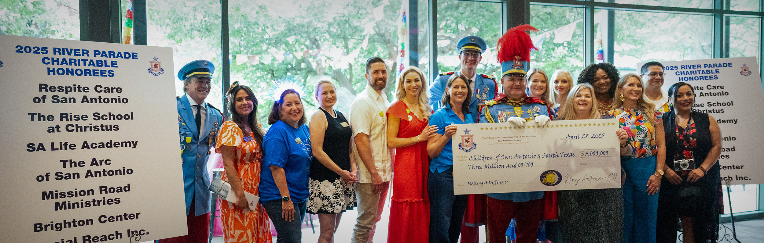 Grant application group photo holding a large check.