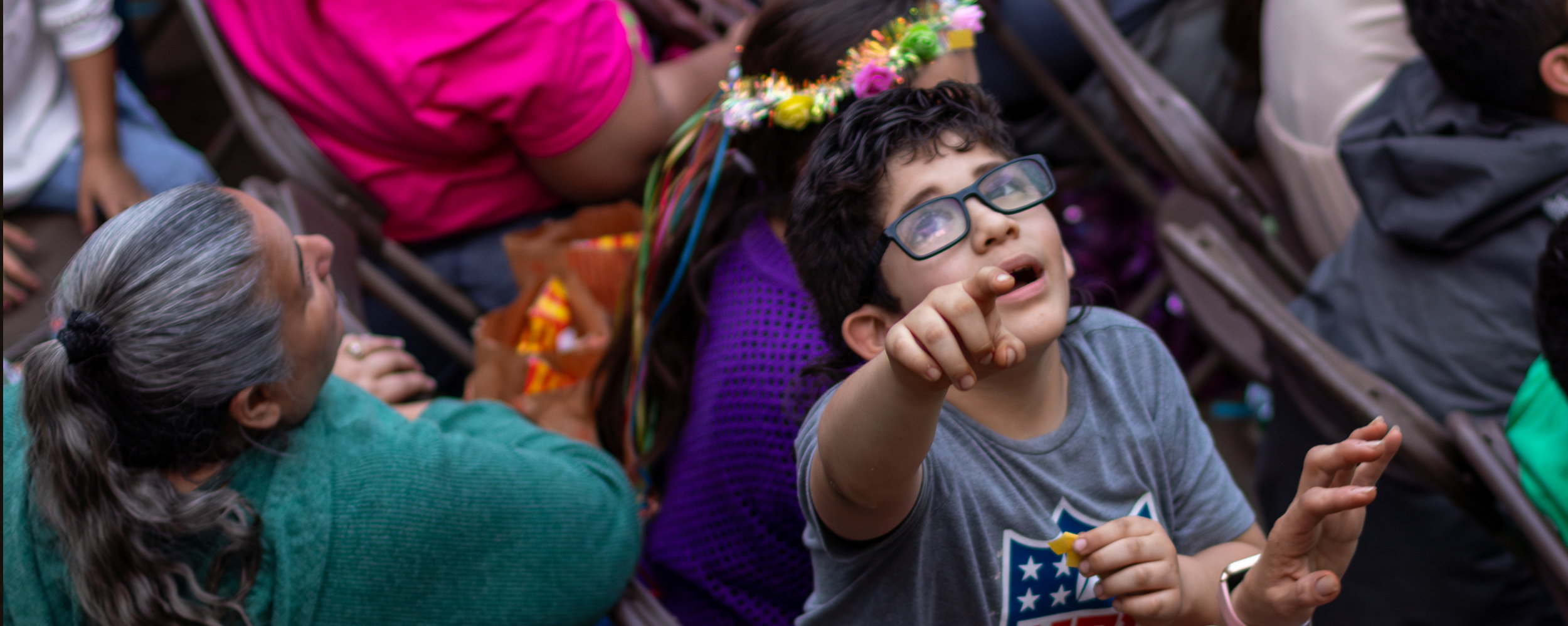 Child attending the river parade.