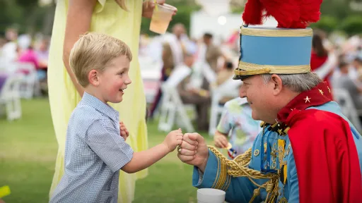 Cavalier with a child.